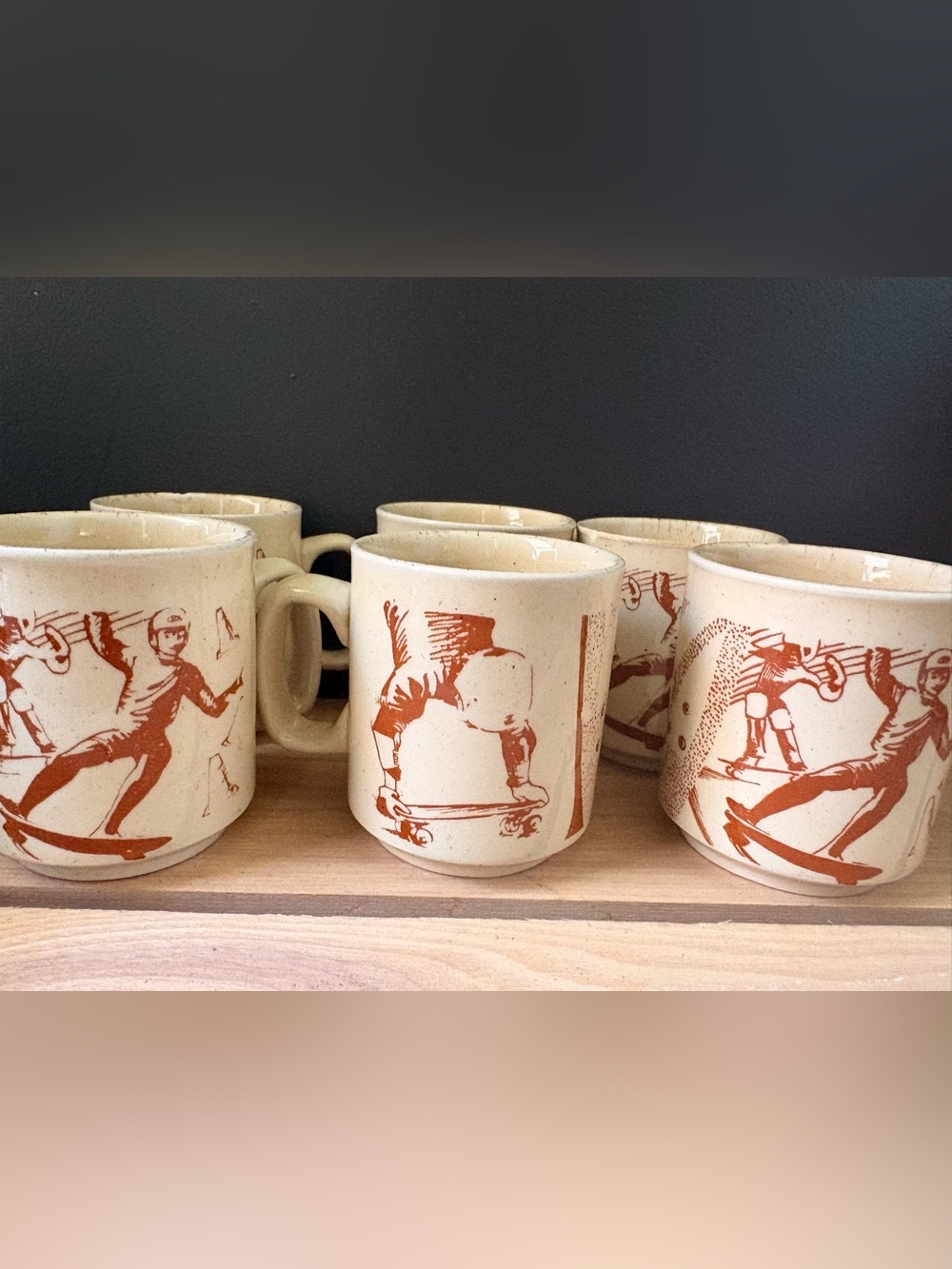 Retro Handcrafted Cream Stoneware Mug with Rust Skateboard Design